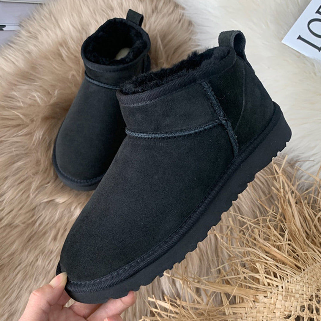 Seitlich schwarze Winterschuhe mit gefütterter Innenseite für Damen